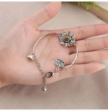 🔥【Compra 1 y llévate 1 gratis】Pulsera de loto giratoria con mantra de seis caracteres de la suerte 2026