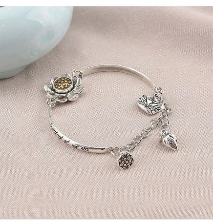 🔥【Compra 1 y llévate 1 gratis】Pulsera de loto giratoria con mantra de seis caracteres de la suerte 2026